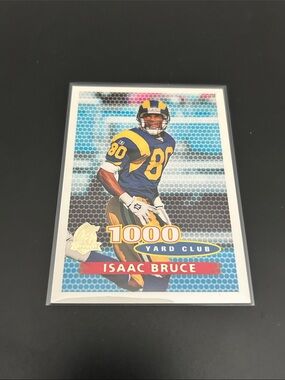 Topps Blue and Yellow Isaac Bruce 1000 Yard Club Football Card